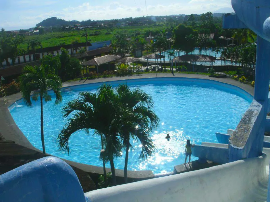 Swimming pool with a mountain view from the preserved resort archive