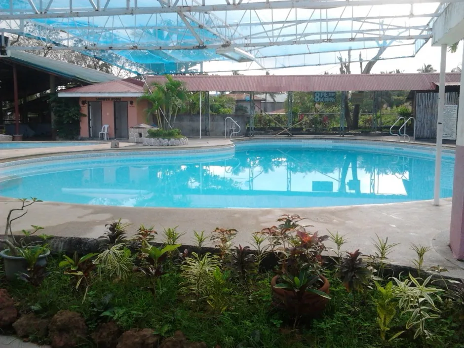 Pool edge and historic wave-pool sign